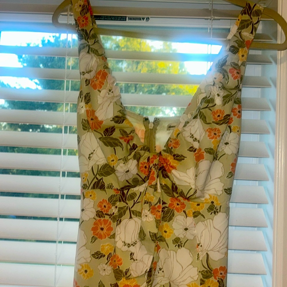 Gorgeous mint green midi adjustable straps back zip side slit.  Cream accents
